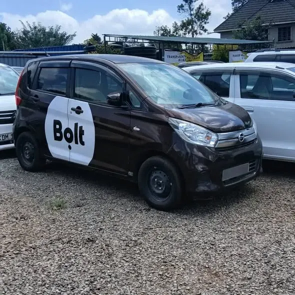 Hakki and Bolt branded ridehailing vehicles in Nairobi